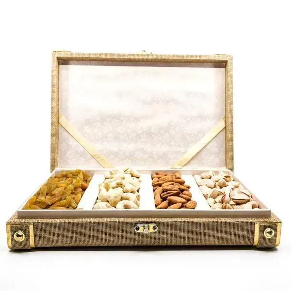 Diwali Dry Fruit Gift Box — Silk Textured Packaging Close-up of textured silk fabric dry fruit gift box with gold embossed branding and satin finish